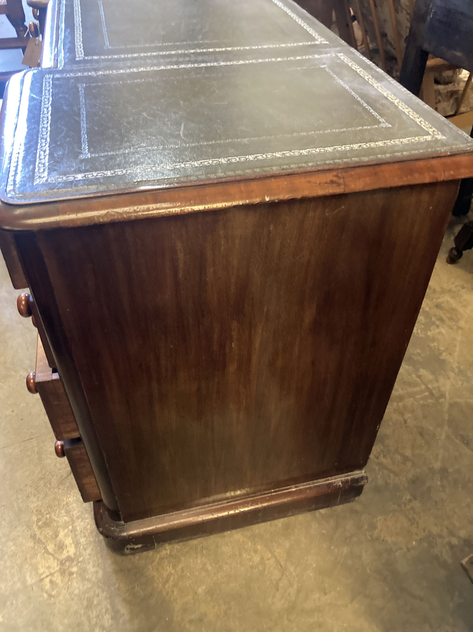 A Victorian mahogany kneehole desk, width 122cm, depth 54cm, height 74cm